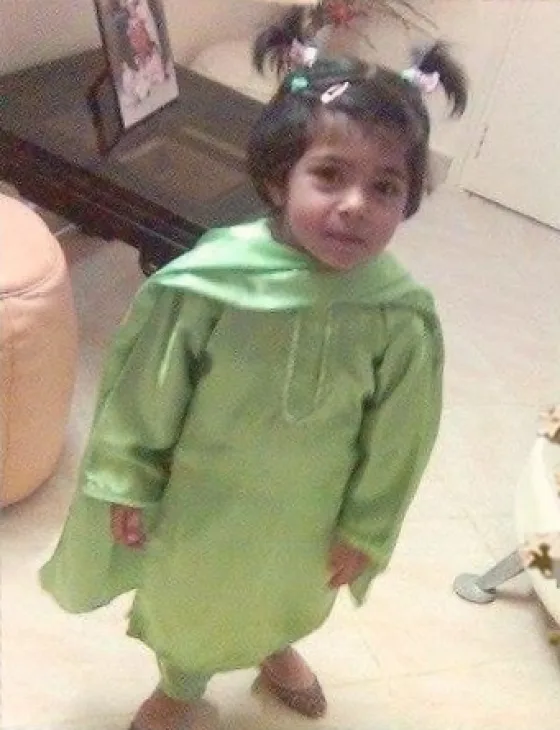 Chanel as a toddler in a green kurta
